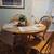 Round dining table with extension and chairs 1 thumbnail