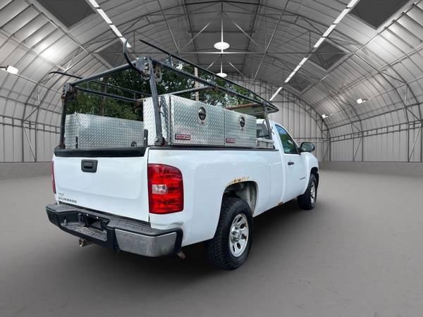 2012 Chevy Silverado CAMA LARGA CON CAJAS Y PORTAEQUIPAJES - $4,950 (riverside)63621970301057123