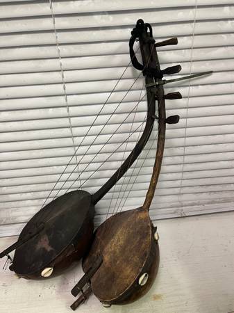 Two vintage African 4-string Adungu musical instruments 1