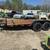 equipment trailer 10,400 gvw  m&m over 22' of deck  reg. $7995 sale 24 thumbnail