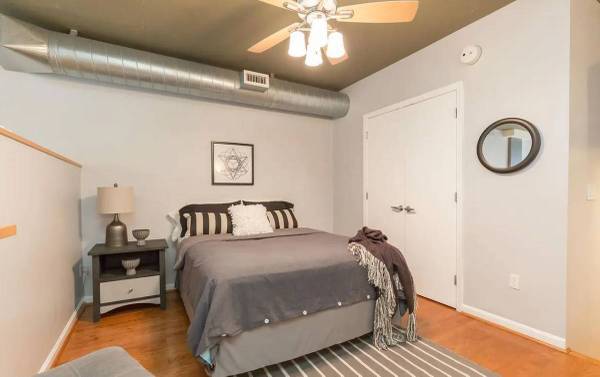 Brick loft with trail views and outdoor pool access 1