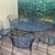 Wrought iron patio table and six stackable chairs with matching bench 3 thumbnail