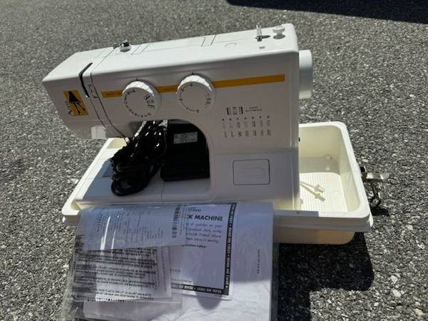 Sewing Machine with Case. - $39 (Belmont, Ma)63470805319171120
