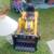 kids' 12V ride-on construction vehicle, specifically an excavator or 2 thumbnail