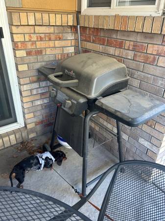 Free gas grill and propane tank.  Charbroil 1