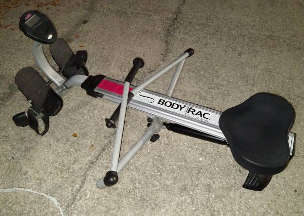 Glider Rowing Machine, Palates Exercise Machine, Heavy Punching Bag 1