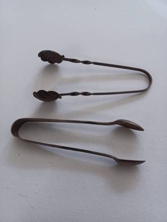 Sterling silver and silver plated sugar tongs. 1