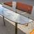 mid-century modern smoked tempered glass dining table brass-toned frame L54”*W 5 thumbnail
