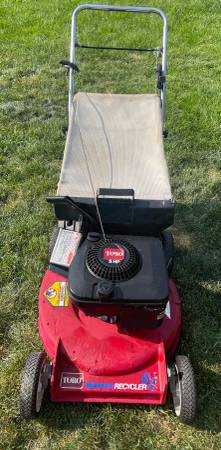 Toro push mower with a bag 1
