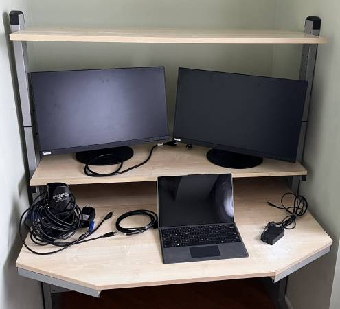 Surface 6 pro, two ThinkVision monitors 24 " and computer workstation 1