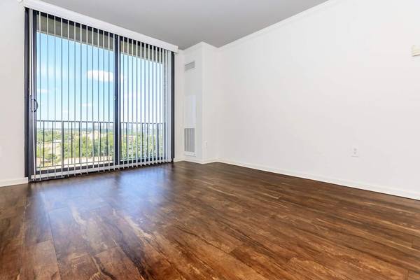 Convenient Elevator Access, Ceiling Fans, Central Air and Heating 1