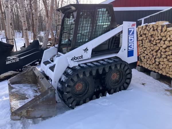 Bobcat 753 Skidsteer and 709 backhoe 1