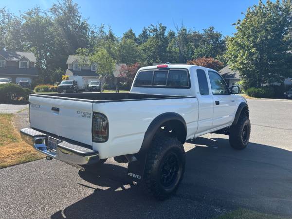 2003 toyota tacoma SR5 4x4 sobrealimentado pocos kilómetros un solo dueño - $14,900 (Puyallup)63624401325187123