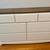 New white dresser with wooden top 1 thumbnail