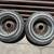 Two 13 inch wire wheels with old tires 1 thumbnail