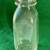 Johnson's Dairy 8 oz. Clear Glass Embossed School Milk Bottle, 1950's 1 thumbnail
