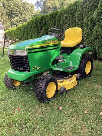 Looking for a nice John Deere LX 280 tractor and mower 1