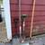 Log rack, yard tools, wine rack, galvanized bins, new hose, TV stand 1 thumbnail