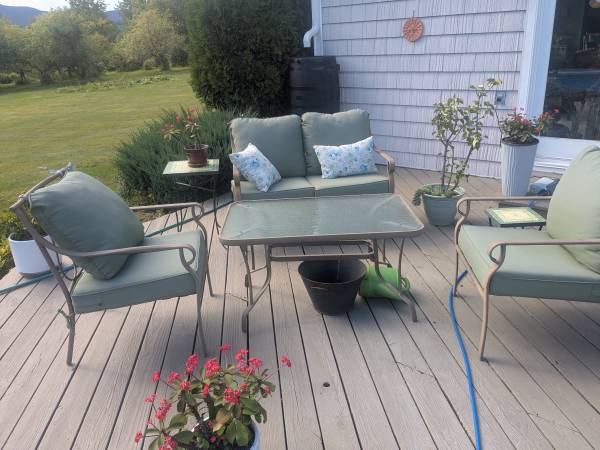 Outdoor couch with two chairs and table 1
