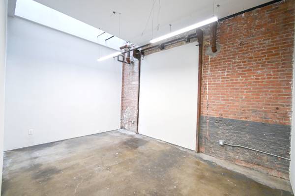 STUDIO 183: SUNLIT CREATIVE STUDIO W INDUSTRIAL BRICK FEATURE WALL 1