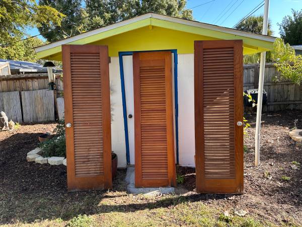 Free for pick-up- 3 hard wood louvered doors 1
