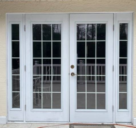 Hurricane rated Dual opening French doors with side lights 1