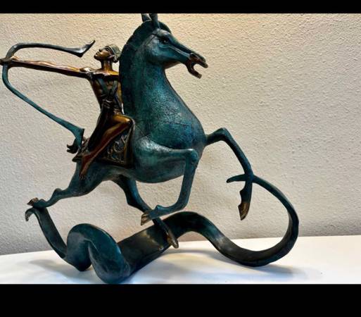 Bronze Statue Guy on horse with bow. 1