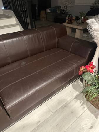 Leather couch ottoman and entertainment unit 1