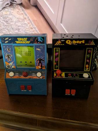 Qbert and Space Invader's hand held Game 1