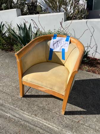 Free chair on sidewalk 1
