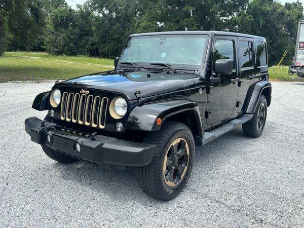 2014 Jeep Wrangler Unlimited Sahara Dragon Edition 4WD - $13,250 (Clearwater, Florida)63443422435587121