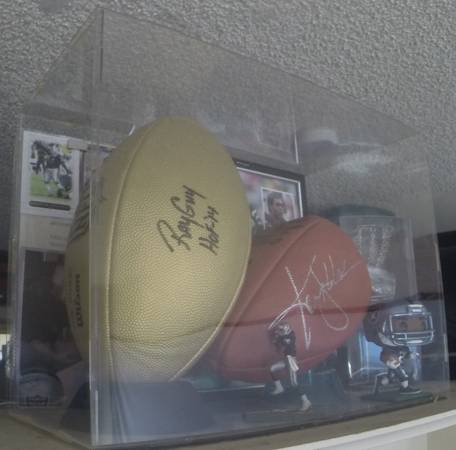 Raiders NFL collectible memorabilia case 2 footballs mag page & 2 fig 1