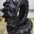 4 new 10-16.5 / 10 ply skid steer tires with rim guard 3 thumbnail