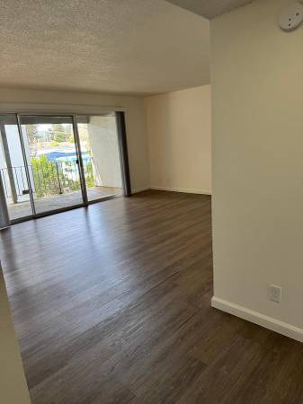 Exclusive 2 BR-Laundry, Balcony & Poolside Fun! 1