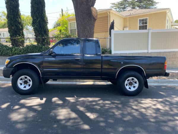 1999 Toyota Tacoma Prerunner Xtracab Solo 169k millas originales - $9,800 (Automático con OD 6 cilindros 3.4 litros Aire acondicionado Bajas millas originales Extra limpio Tapicería)63623825751297121