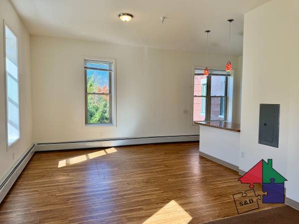 1 Spacious Second Floor 2-Bedroom - Heat Included and Laundry On-Site! 1
