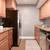 THE SPACIOUS BEDROOM WITH RECESSED LIGHTING FEATURES A DEN WHICH IS P 8 thumbnail