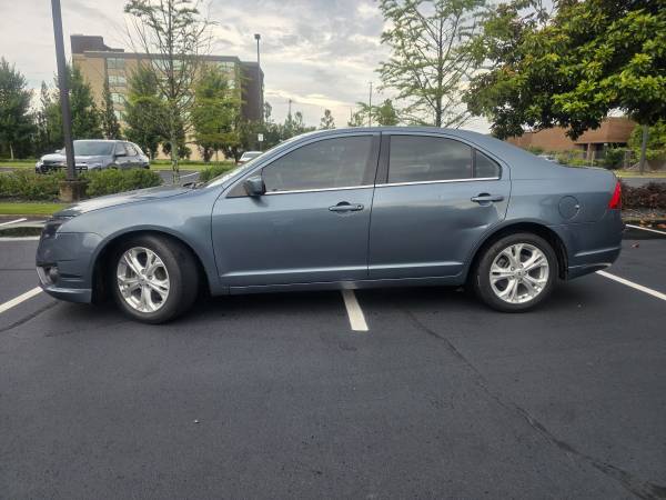 2012 Ford Fusion SE Sunroof! All Power! Cold AC! Current Emission! Drives nice!! - $4,500 (Marietta)63621191174401124