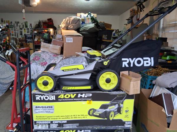 New in box battery power robi push mower 1