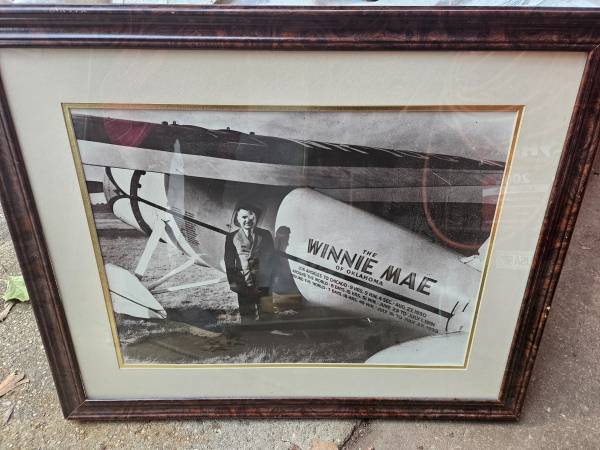 Wiley Post and his plane Winnie Mae, framed photocopy 1