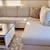 Like New 2 pcs Sectional Furniture with Chaise Cream color Ashely's Furniture 2 thumbnail
