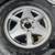 GMC Envoy 17 inch aluminum rims with old tires. Fits chevy trailblazer 5 thumbnail