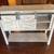 Petite White Cabinet with 2 sliding Barn Doors 2 thumbnail