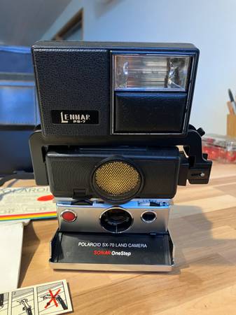 Polaroid SX-70 Land Camera Sonar OneStep Camera & Lenmar PS7
