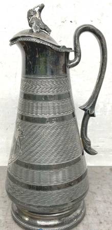 Unique metal pitcher with incised linear patterns & grape vine finial 1