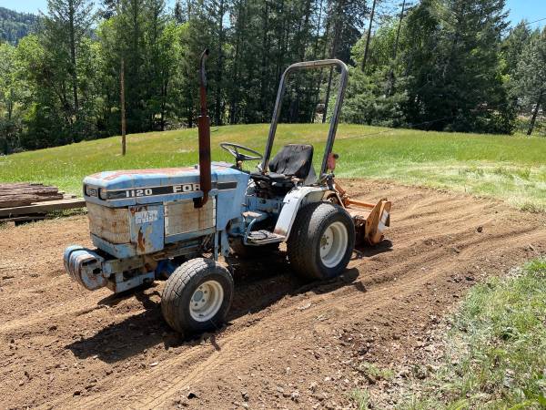 Ford 1120 compact tractor 4x4 w/tiller 1