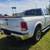 2016 *Ram* *1500* *4WD Crew Cab 149 Laramie* White 4 thumbnail