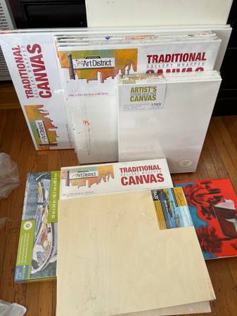 LOT 2: Unused stretched canvases and wood panel of various sizes from 1
