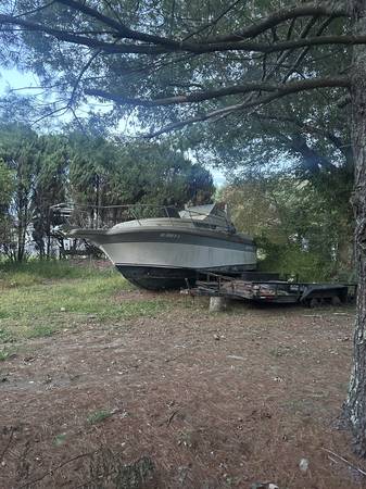 FREE  Good size fiberglass boat 1