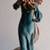 Chrisdon, 24" resin figurine of a lady holding a parasol. 3 thumbnail